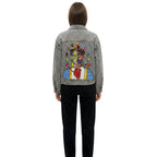 Rear view of a model wearing the 1-of-1 Frida’s Heart embroidered jacket showing scale and detail.