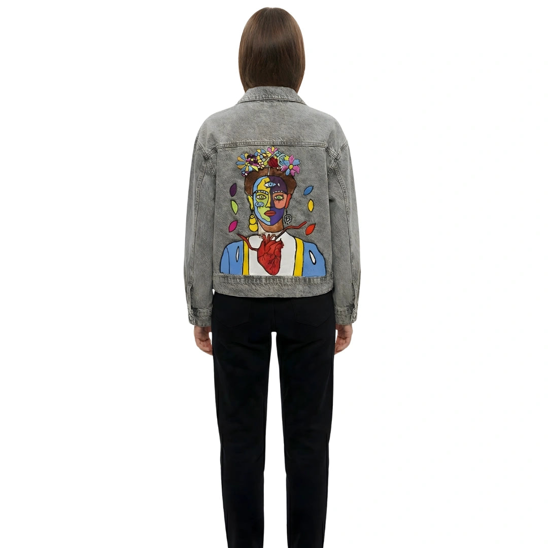 Rear view of a model wearing the 1-of-1 Frida’s Heart embroidered jacket showing scale and detail.